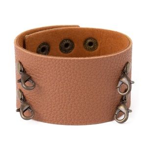 Set of 2 Plunder brown and black leather cuff bracelets.